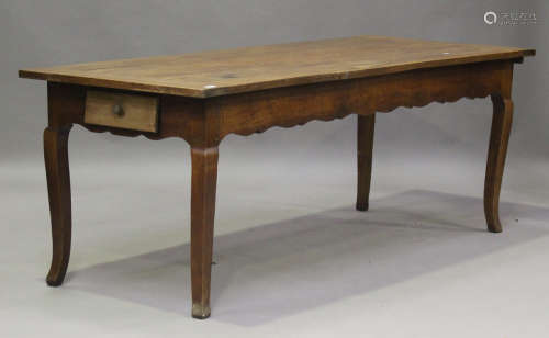 A 19th century French cherrywood kitchen table, fitted with ...