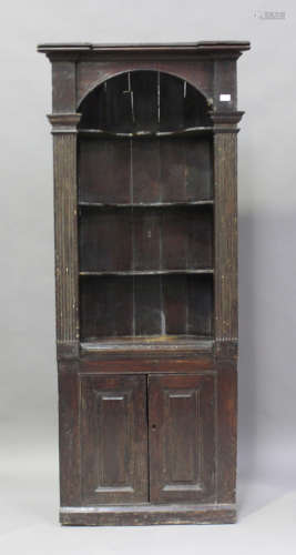 An 18th century provincial stained pine barrel back corner c...