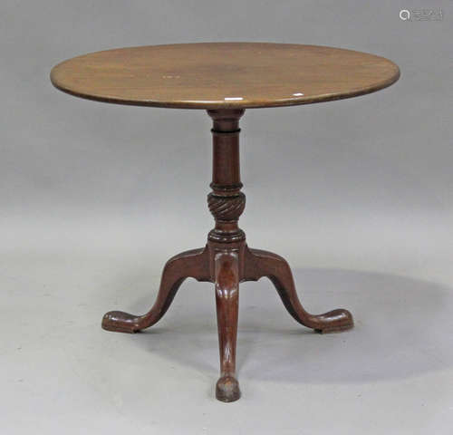 A late George III mahogany tip-top wine table, on tripod cab...