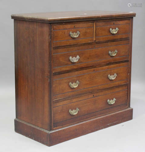 An Edwardian walnut chest of two short and three long drawer...