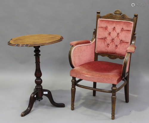 A Victorian mahogany shaped oval wine table, on tripod legs,...
