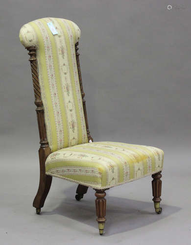 An early 19th century rosewood prie-Dieu chair, the upholste...