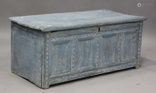 An 18th century blue painted pine coffer, the hinged lid abo...