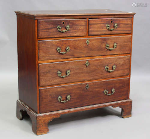 A George III mahogany chest of two short and three long draw...