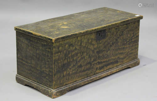 A 19th century scumbled elm blanket box, raised on bracket f...