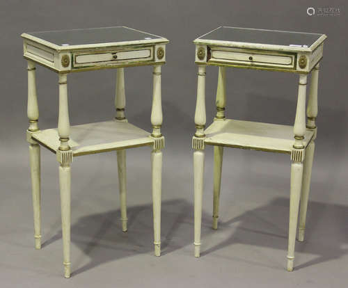 A pair of 20th century French style white and gilt painted b...