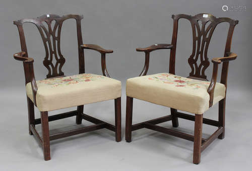 A pair of 19th century mahogany pierced splat back elbow cha...