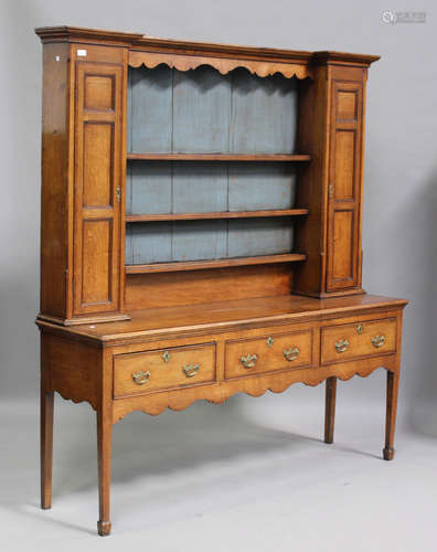 An early 19th century provincial oak and mahogany crossbande...