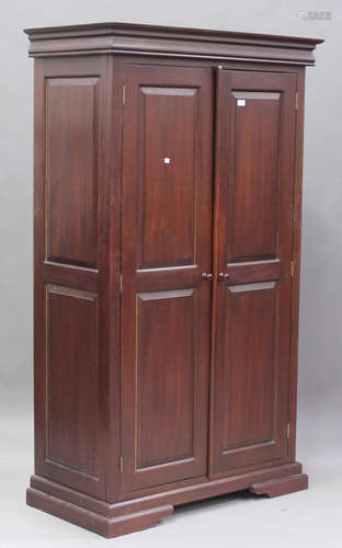 A late 20th century Victorian style hardwood two-door wardro...