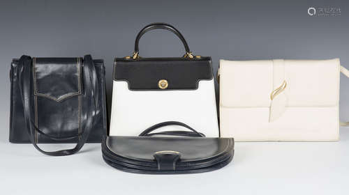 A group of four designer handbags, comprising a Didier Lamar...