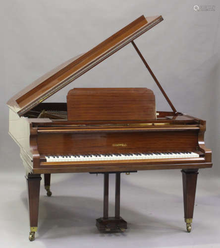 A mid-20th century mahogany boudoir grand piano by Chappel o...