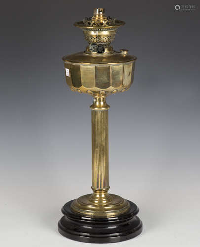 A late Victorian brass table oil lamp, converted to electric...