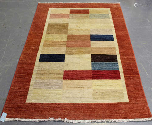 An Afghan gabbeh rug, late 20th century, the field with over...