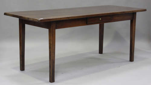 A late 19th century French cherrywood kitchen table, fitted ...