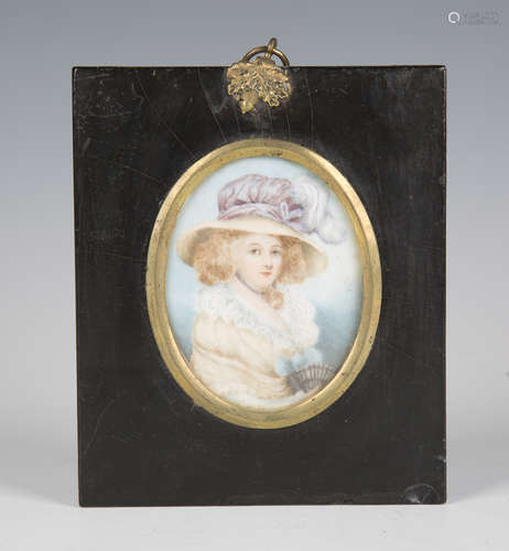 A late 19th/early 20th century watercolour on ivory portrait...