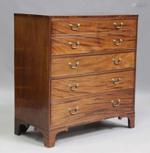A late George III figured mahogany secrétaire chest of drawe...