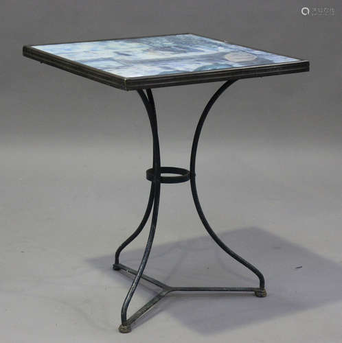 An early 20th century French wrought iron bistro table, rais...