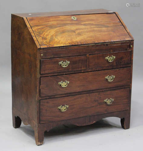 A George III mahogany bureau, the fall-front revealing a fit...