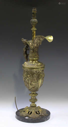 A late 20th century cast gilt metal ornamental table lamp of...