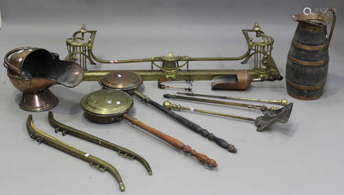 A group of fireside metalware, including an Edwardian brass ...