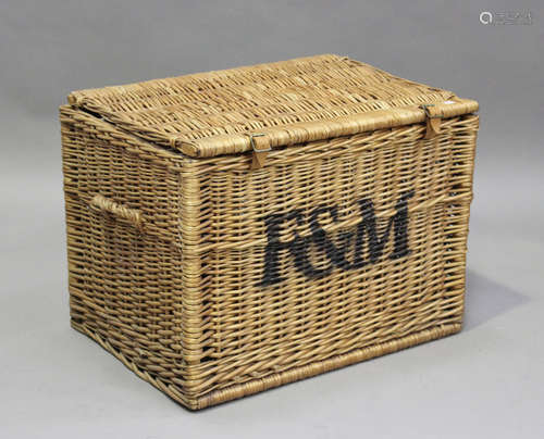 A wicker hamper, the front with Fortnum & Mason stencil mono...