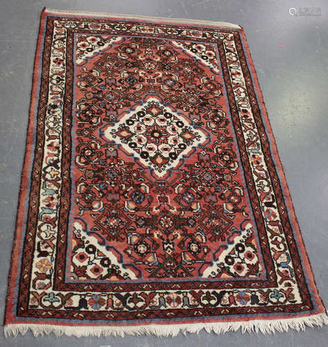 A small Hamadan rug, North-west Persia, mid-20th century, th...