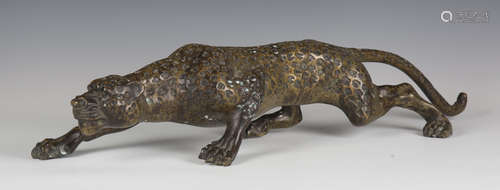 A late 20th century patinated cast bronze model of a prowlin...