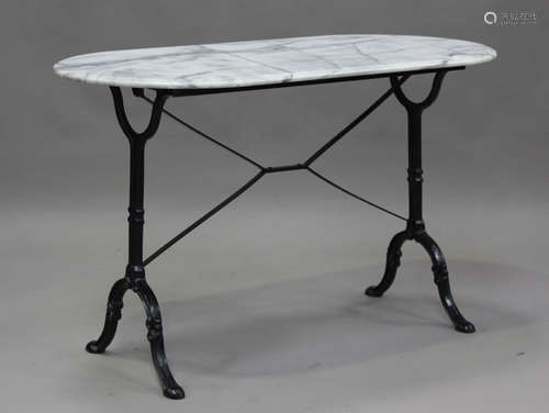 A 20th century marble-topped bistro table with cast iron bas...