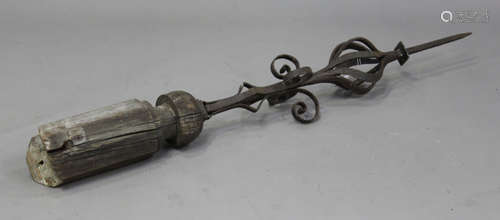 A 19th century wrought iron architectural finial of scrollwo...