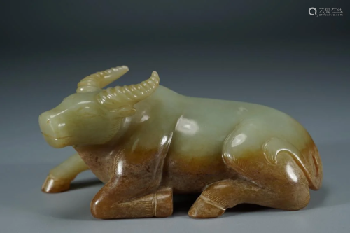 CHINESE JADE CARVING OF A CROUCHING BULL