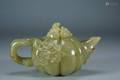 A MELON RIDGED CELADON JADE CARVING TEAPOT