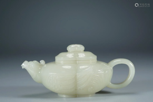 A PHOENIX-RELIEFS JADE CARVING RIDGED TEAPOT