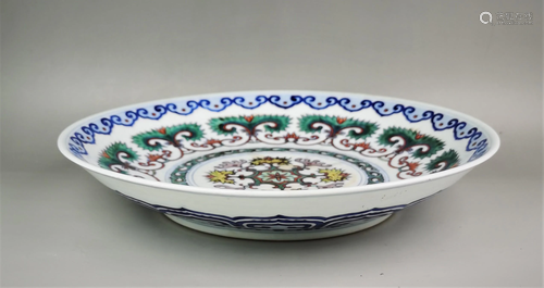 A Chinese blue and white and docai porcelain plate