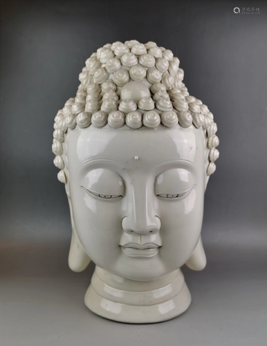 A Chinese white glazed Buddha's head