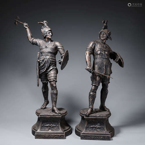 A pair of copper figure ornaments