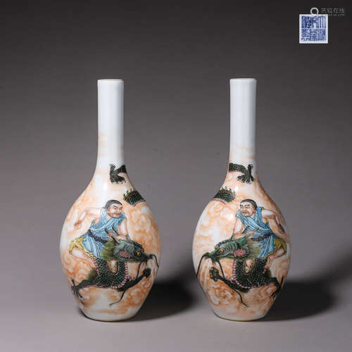 A pair of famille rose arhat porcelain vases