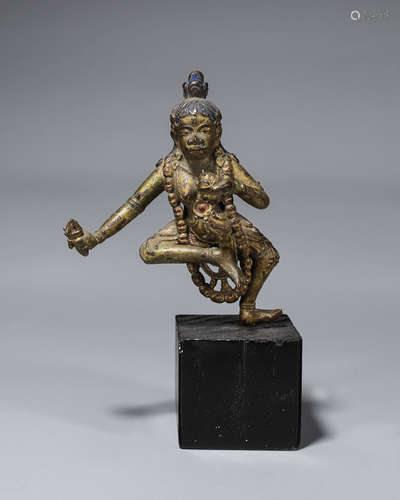 A copper buddha statue