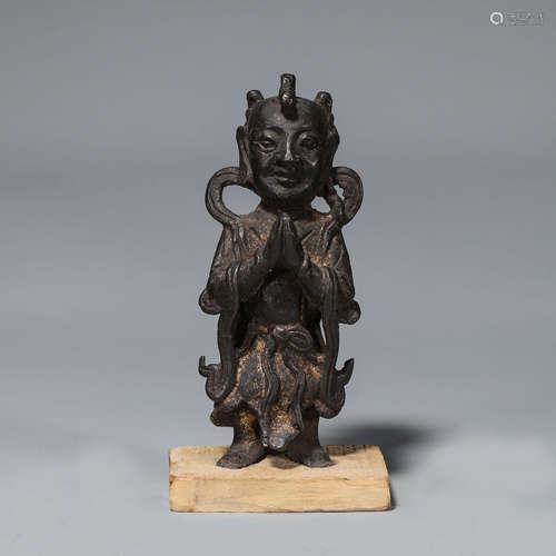 A copper statuette