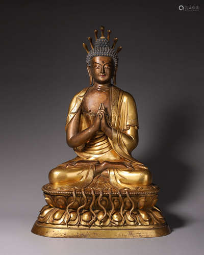 A gilding copper buddha statue