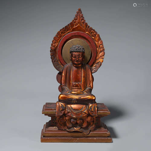 A gilt wood carved Sakyamuni buddha statue