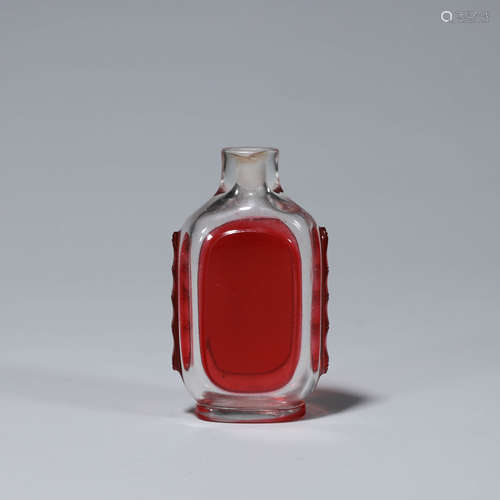 A crystal ground red glass snuff bottle