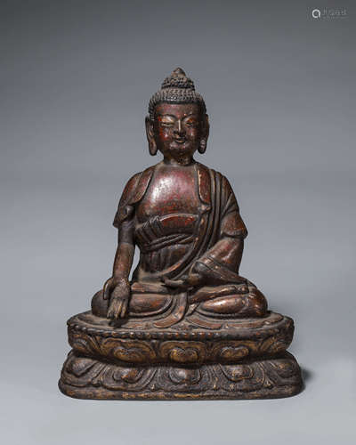 A porcelain Sakyamuni statue