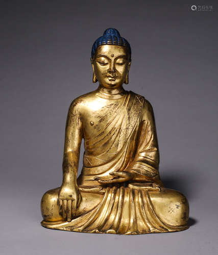 A gilding copper Sakyamuni buddha statue