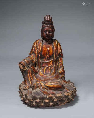 A clay Guanyin statue