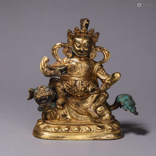 A gilding copper buddha statue