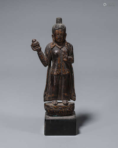 A gilt red sandalwood figurine