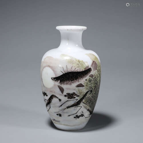 A fish and seaweed porcelain vase