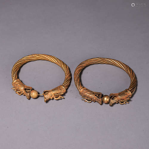 A pair of gilding silver dragon head bracelets