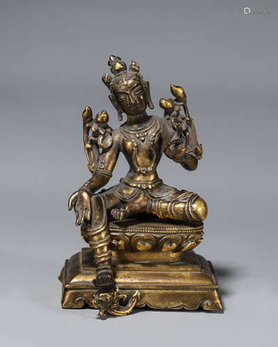 A gilding copper buddha statue