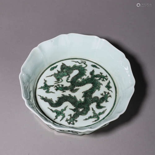 A green glazed cloud and dragon porcelain basin